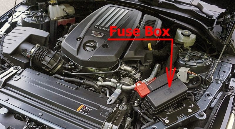 the location of the fuses in the engine compartment: cadillac ct4 (2020, 2021)