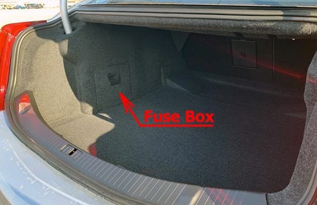 the location of the fuses in the trunk: cadillac xts (2013-2018)